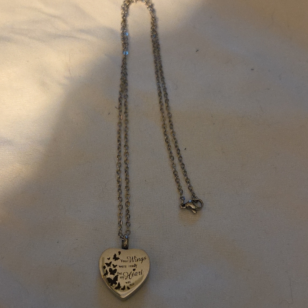 Charming Silver Heart Necklace with Butterfly Design